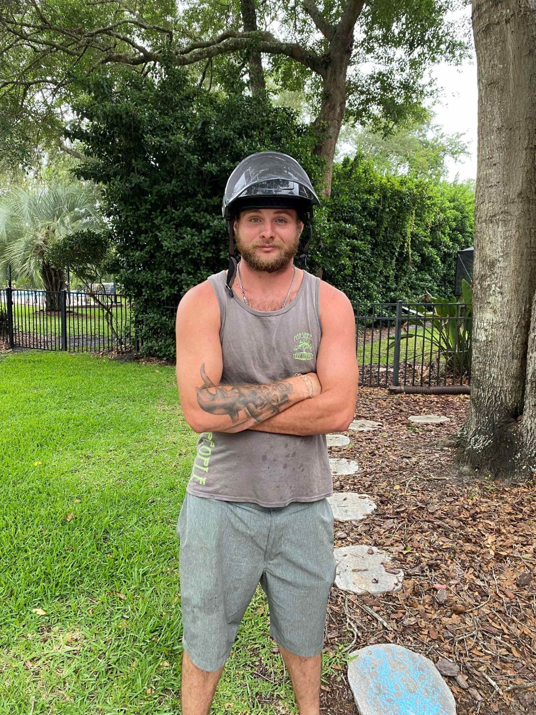 Garrett Forshee from Forshee Tree Services posing while on a job site